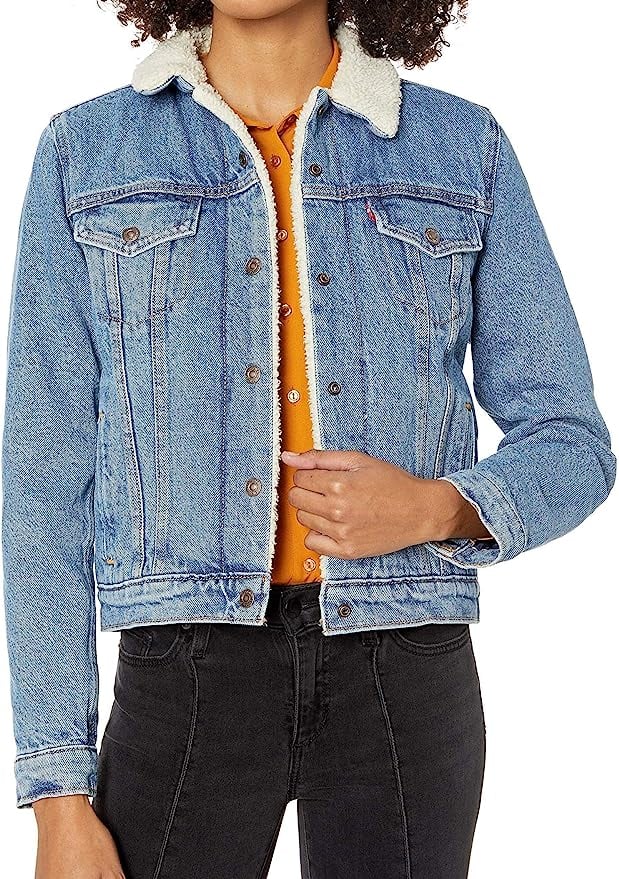 Levi's Original Sherpa Trucker Jacket ($65, originally $108)
OK, we're calling it: this is the ultimate cool-girl jacket. Denim jackets are already winners in our book, but this style takes the layer to the next level with its distressed colouring, hardware accents, and cosy sherpa lining. You can wear it over a maxi dress during the summer months or on top of a chunky sweater during the cooler seasons — the styling options are endless.