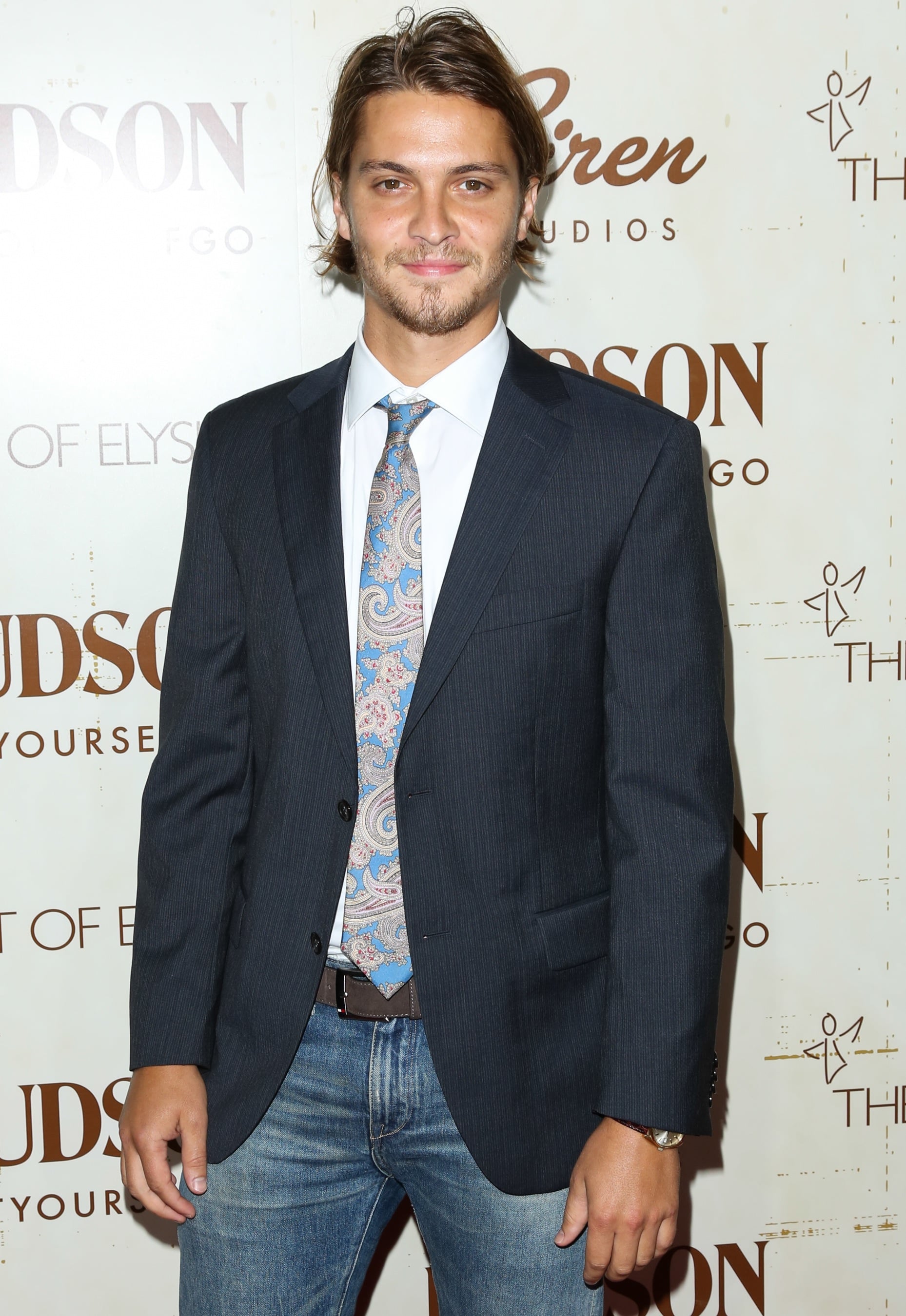 Luke Grimes as Elliot. 