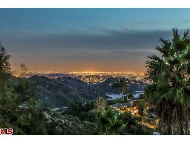 The home's spectacular views extend to Canyon Reservoir, downtown LA, and beyond.