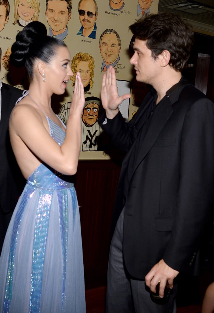 Katy Perry got a high five from John Mayer at the Sony Music bash.