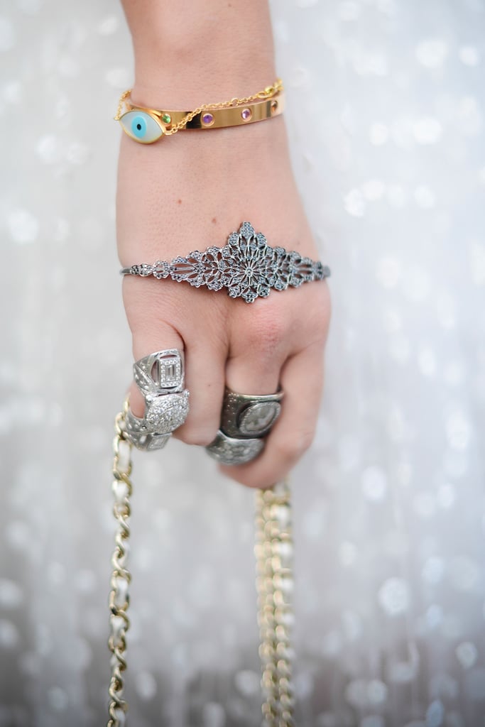 What to Toss: Jewelry that serves no purpose. Comb through your earrings, rings, necklaces, and see which styles you really wear, plus get rid of any items you haven't worn in months. 
What to Wear Now: A statement gold bracelet.