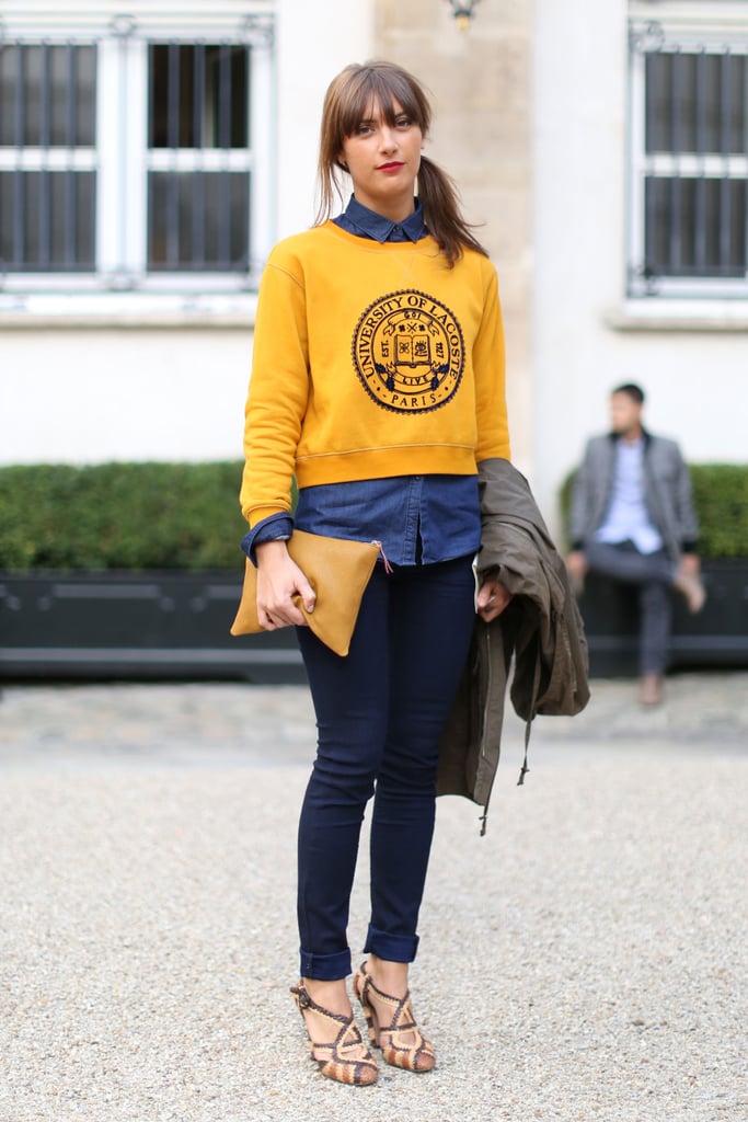 A pop of yellow on her cheeky sweatshirt lent a cool-girl dynamic to her denim on denim.
A pop of yellow on her cheeky sweatshirt lent a cool-girl dynamic to her denim on denim.