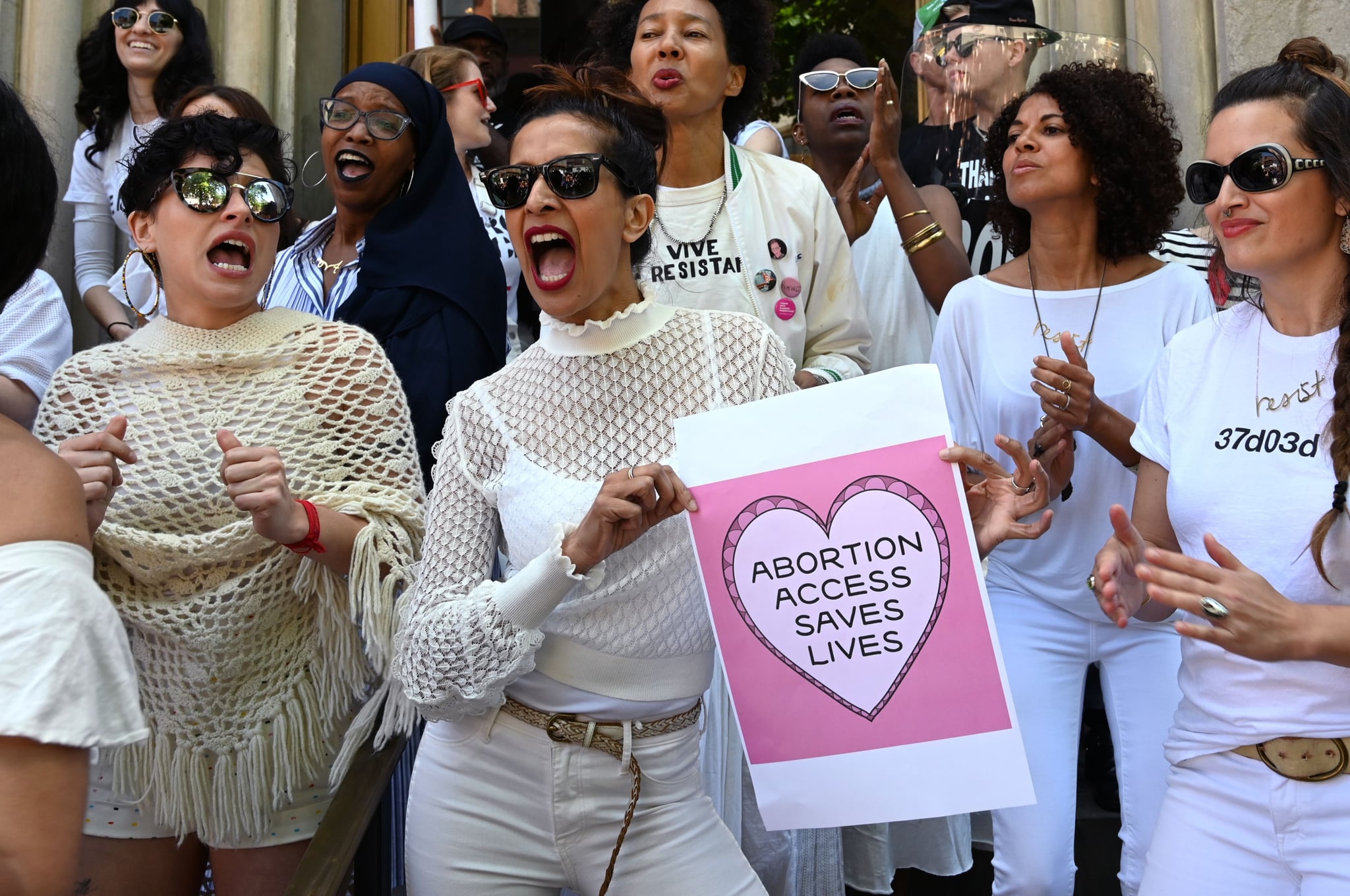 Women from the Resistance Revival Chorus take part in an abortion rights rally in front of the Middle Collegiate Church in the East Village of New York on May 21, 2019. - Demonstrations were planned across the US on Tuesday in defence of abortion rights, which activists see as increasingly under attack. The