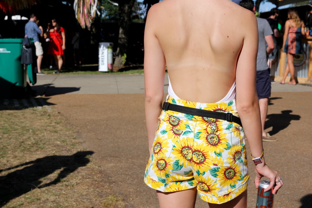 Her backless bodysuit let these fun cuffed shorts speak for themselves from behind.