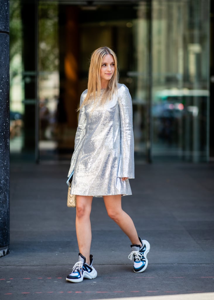 This is how you make a metallic dress work for day — just add sneakers.