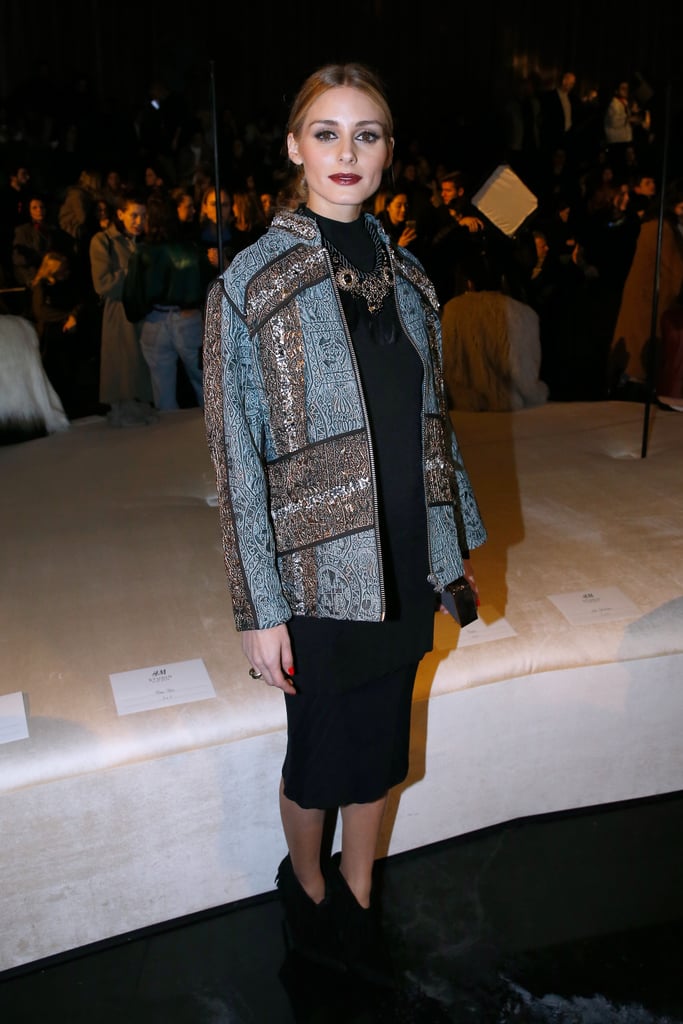 For H&M's Fall show in Paris, Olivia added interest to an LBD with an embroidered jacket and jeweled necklace. For H&M's Fall show in Paris, Olivia added interest to an LBD with an embroidered jacket and jeweled necklace.