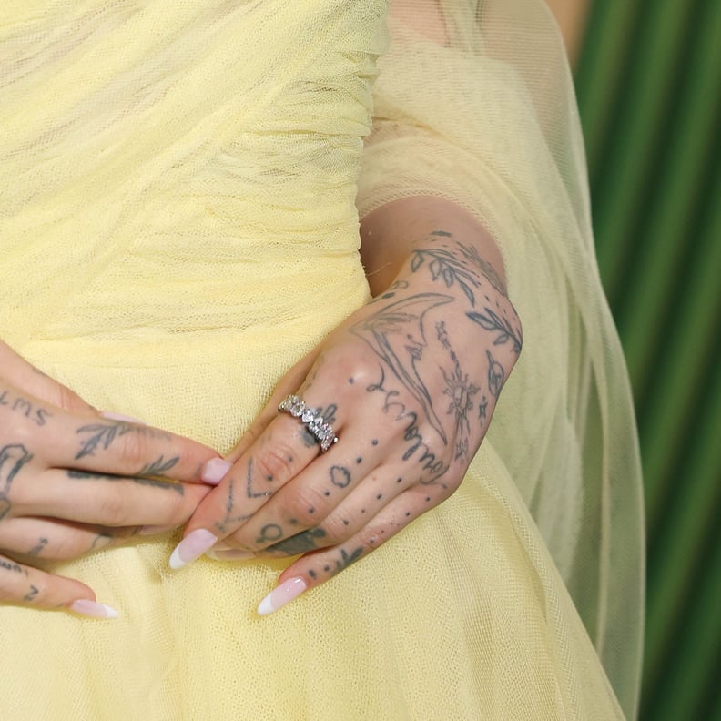 Ariana Grande's "Toulouse" Hand Tattoo