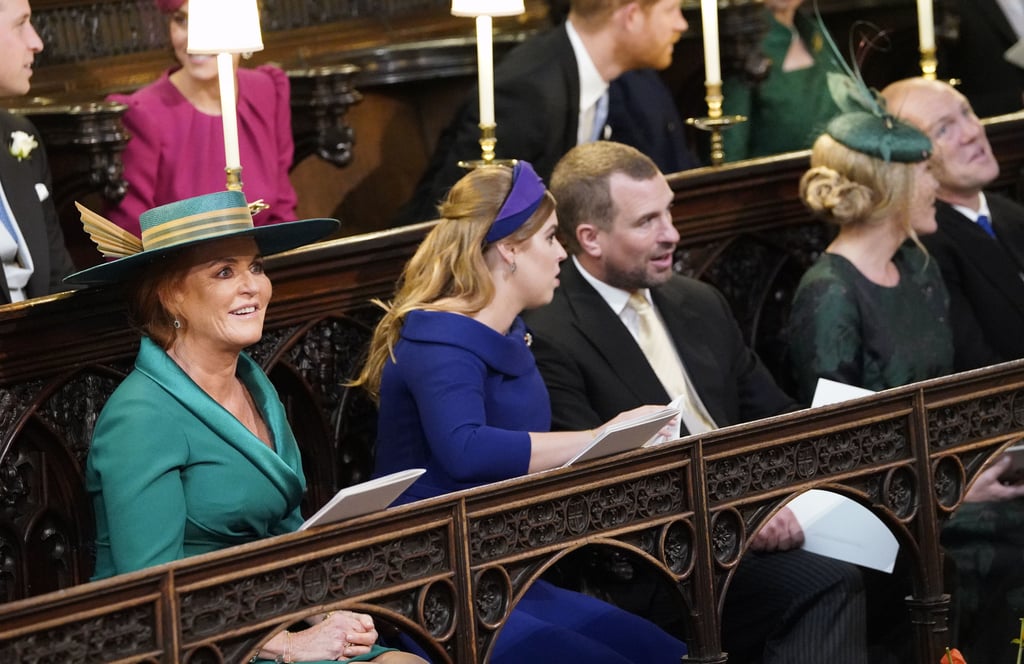 The Duchess of York was seated next to her daughter, maid of honor Princess Beatrice of York. Next to Princess Beatrice in the front row is her and Eugenie's cousin, Peter Phillips, the Queen's oldest grandson and the son of Anne, Princess Royal, and his wife Autumn.