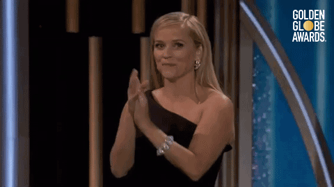 Reese giving us tears, claps, and smirks from behind the podium.