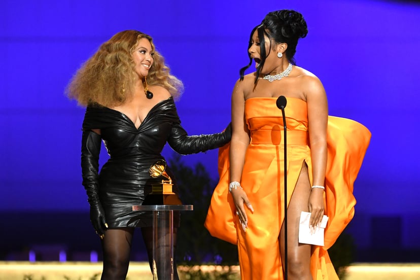 LOS ANGELES, CALIFORNIA - MARCH 14: (L-R) Beyoncé and Megan Thee Stallion accept the Best Rap Performance award for 'Savage' onstage during the 63rd Annual GRAMMY Awards at Los Angeles Convention Center on March 14, 2021 in Los Angeles, California. (Photo
