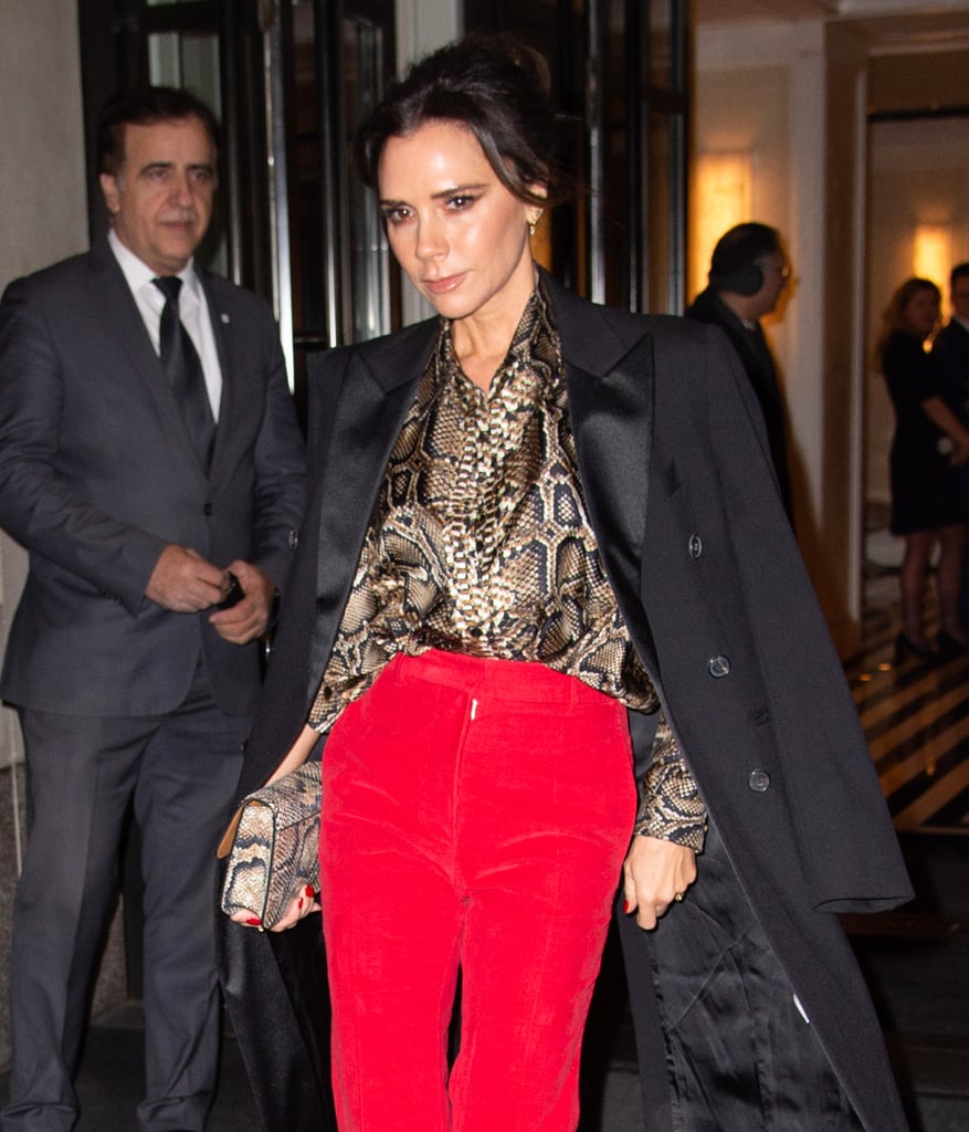 Victoria Beckham Red Pants and Snakeskin Blouse January 2019