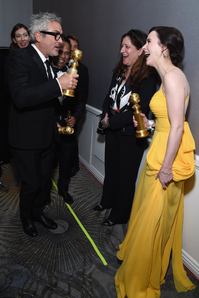 Pictured: Alfonso Cuarón and Rachel Brosnahan
