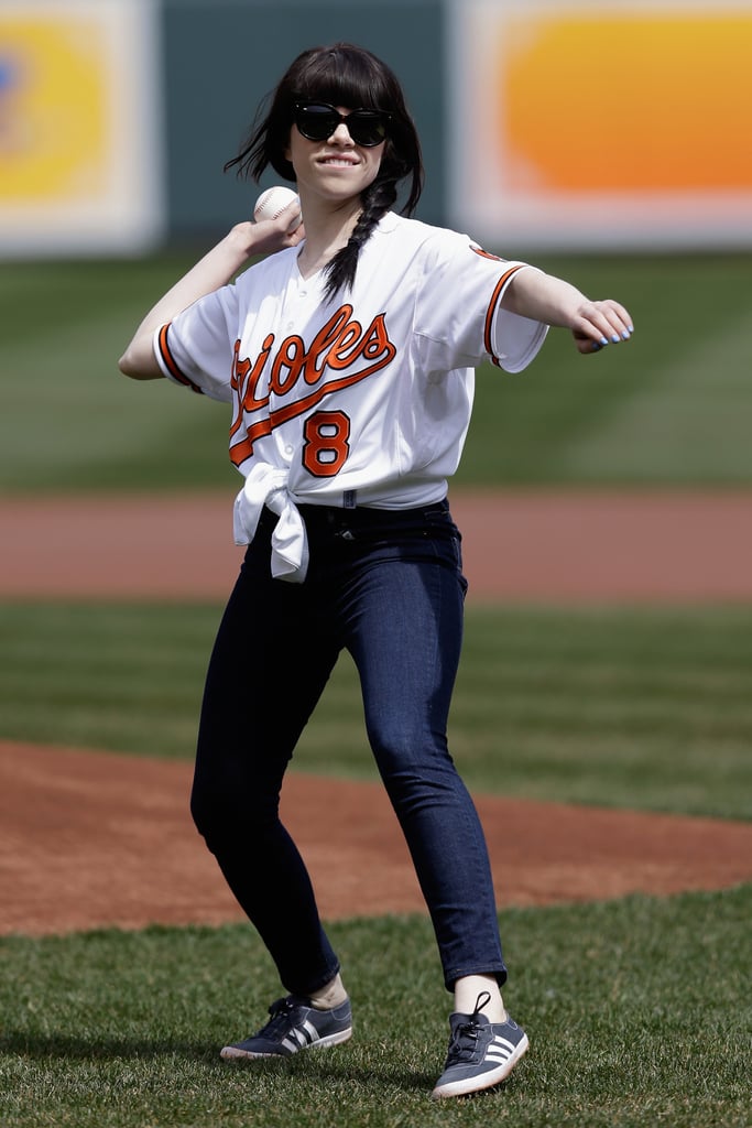 Carly Rae Jepsen tied up her Baltimore Orioles jersey for the first pitch in April 2013.