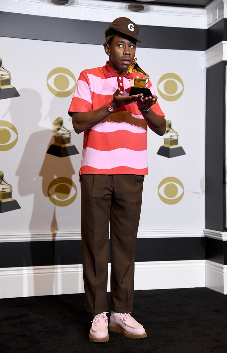 Accepting his Grammy in a Golf le Fleur shirt he designed with Lacoste.