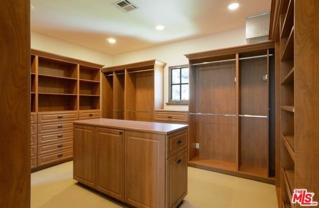 The fashion designer will have plenty of room to store her clothes in this massive walk-in closet.