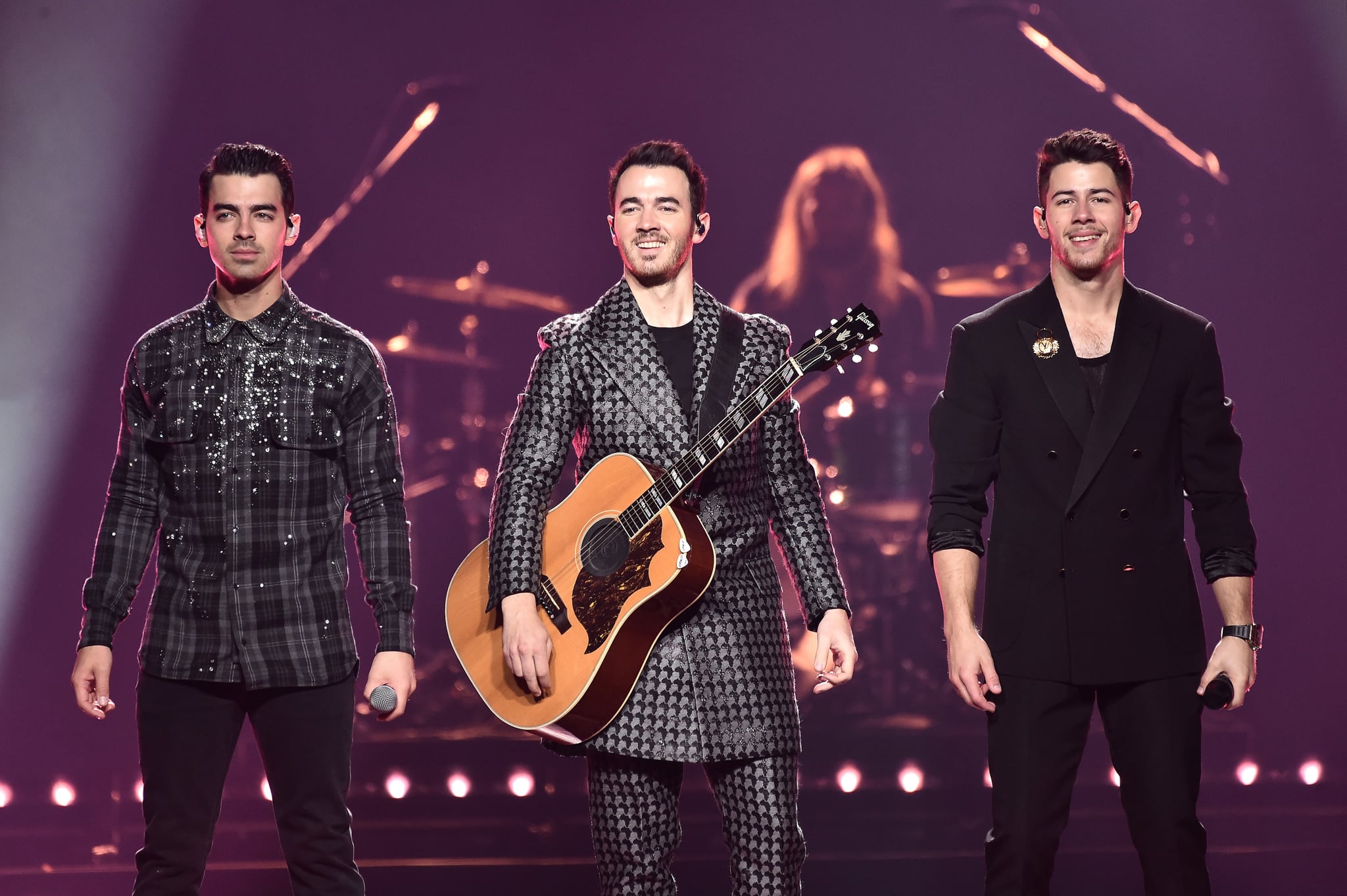 NEW YORK, NEW YORK - NOVEMBER 23: Joe Jonas, Kevin Jonas, and Nick Jonas of The Jonas Brothers perform at Barclays Center on November 23, 2019 in New York City. (Photo by Steven Ferdman/Getty Images)