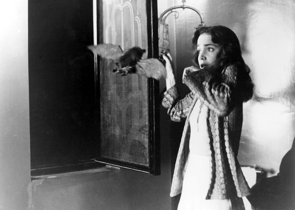 In Suspiria, Susie has to fend off the same animal, only she takes it out with a stool.