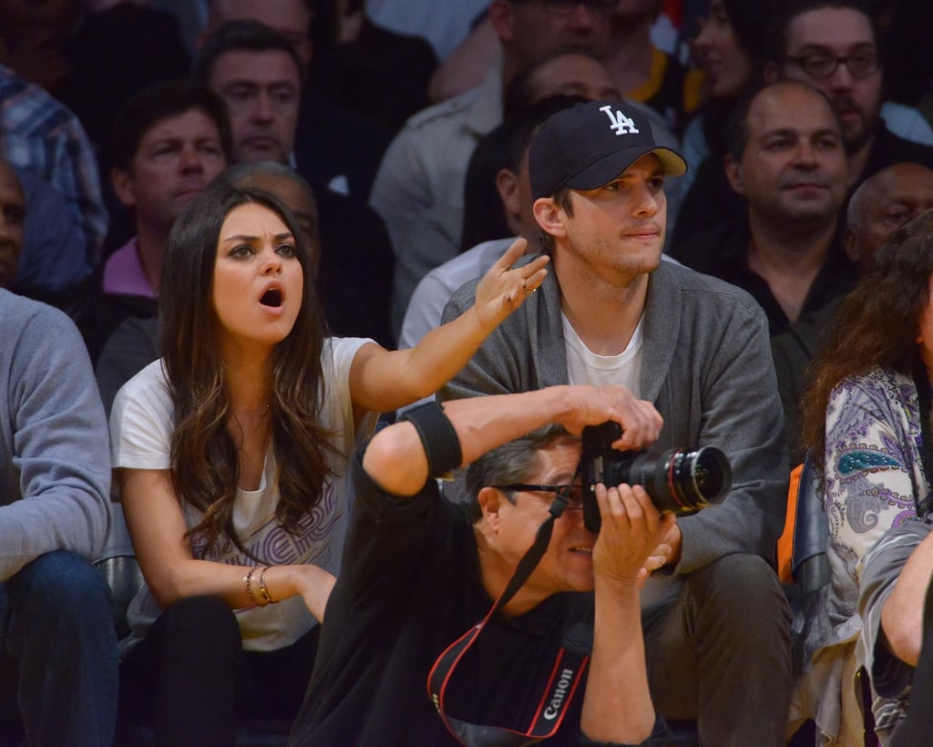 Mila Kunis looked outraged by a play during an LA Lakers game with Ashton Kutcher in February 2013.