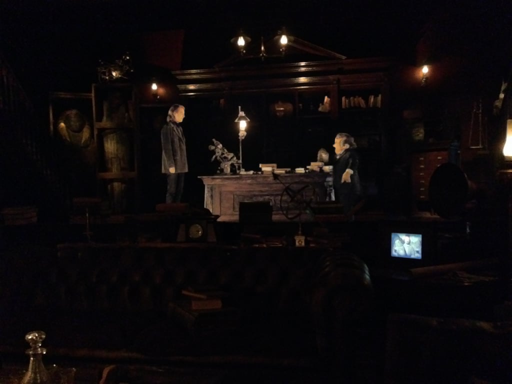 As you progress in the queue for the ride you stop to watch a preshow that takes place in Bill Weasley's office. There are real props in the foreground while the introduction takes place on a screen in the background. You can even see moving portraits of the Weasleys, including the photo of them in Egypt which is featured in the movie.