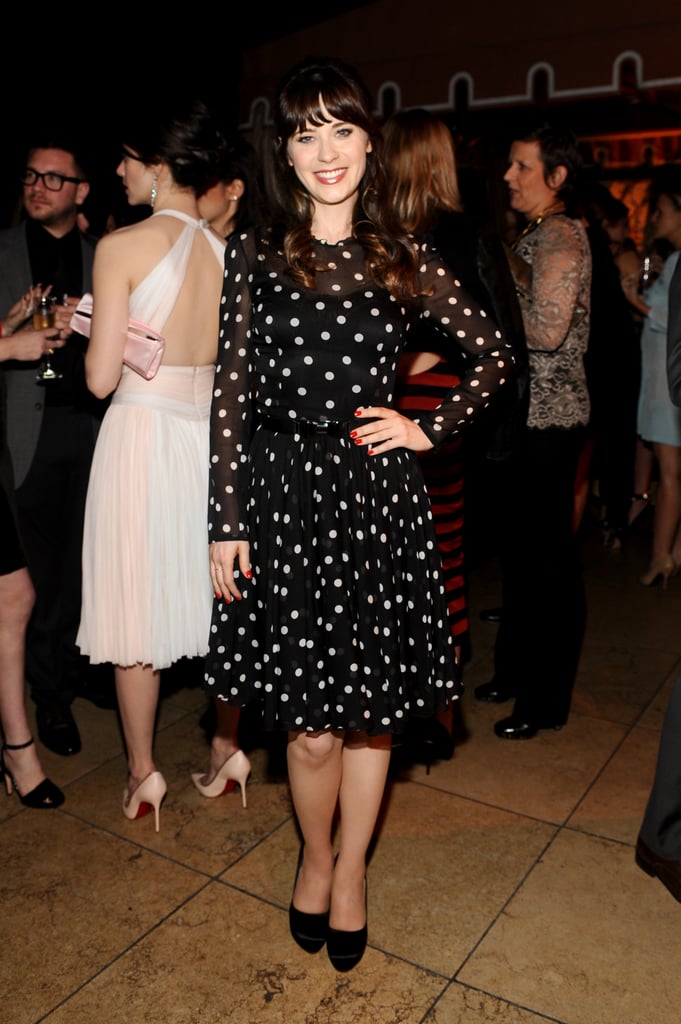 Zooey Deschanel wore a polka-dot Dolce & Gabbana look to the event, where she told us she's not tired of talking about Prince. He'll be appearing on New Girl as her "love coach" on an upcoming episode.