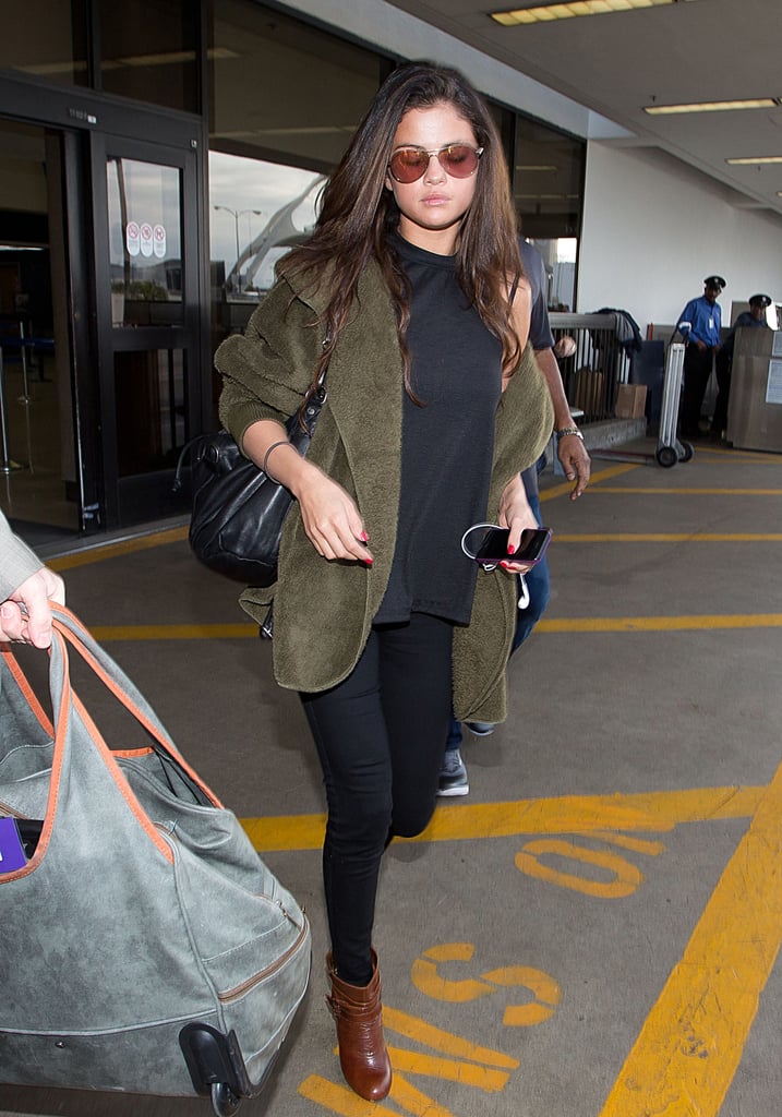 Black Pants, a Black Sleveless Top, and an Army Green Jacket