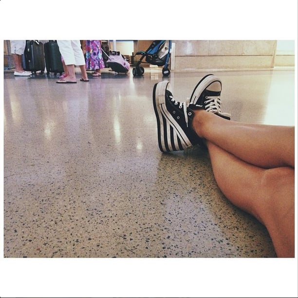 Betty Who rocked custom wedge sneakers en route from LAX to Chicago.
Source: Instagram user iambettywho
