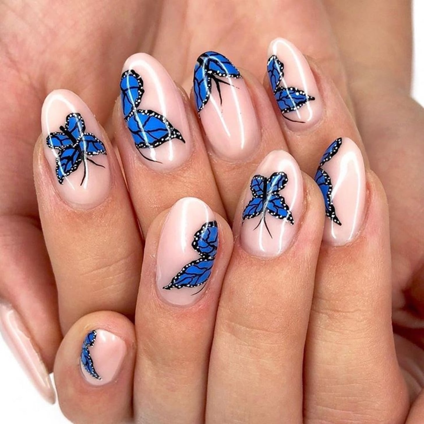 Nail Artist Creates Color-Changing Butterfly Manicure — See Photo | Allure