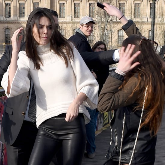 Fan Tries Kissing Kendall Jenner in Paris | Pictures