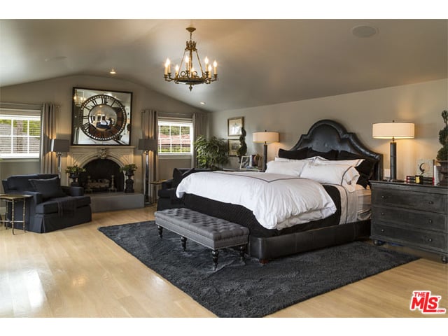 The Upstairs Master Suite Has A Fireplace And French Doors