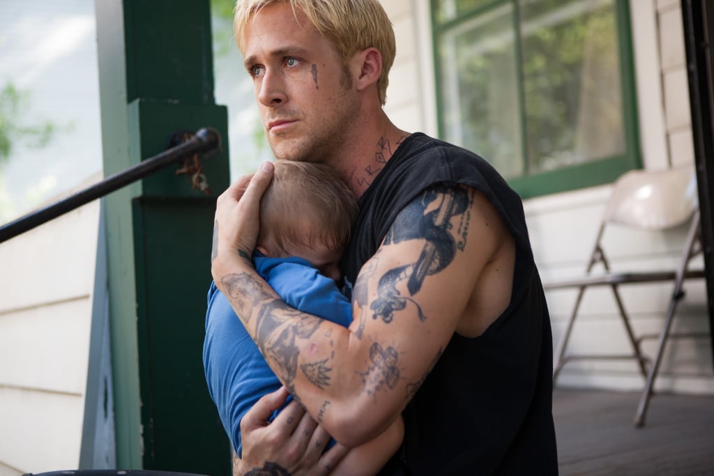 In The Place Beyond the Pines, a blond Ryan held onto his little boy.