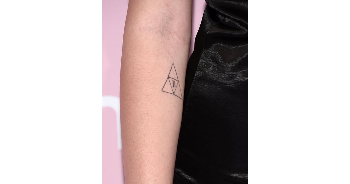 Noah Cyrus's Triforce Symbol Tattoo | Noah Cyrus Has 35+ Tattoos and  Counting, All With Special Meanings | POPSUGAR Beauty Photo 4