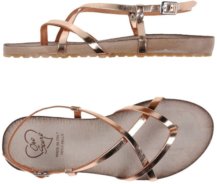 Pair OROSCURO toe-strap sandals ($63, originally $91) with your favorite denim shorts and a white t-shirt.