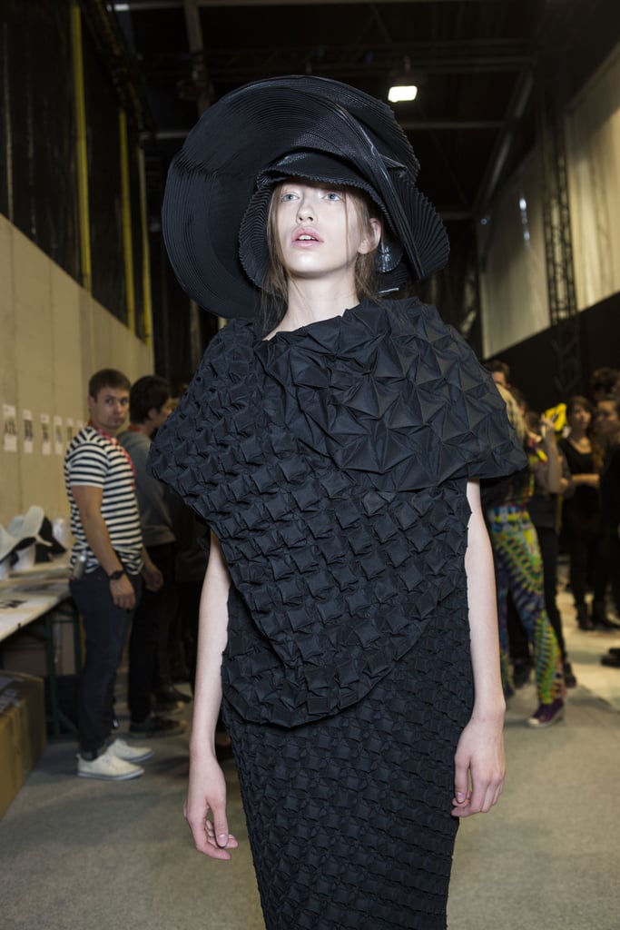A Model Backstage at the Issey Miyake Show | Backstage Photos Fashion ...