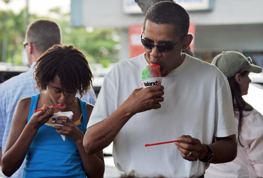 Barack and Malia enjoyed some shaved ice outside the Island Snow store in Kailua, HI, in January 2010.
