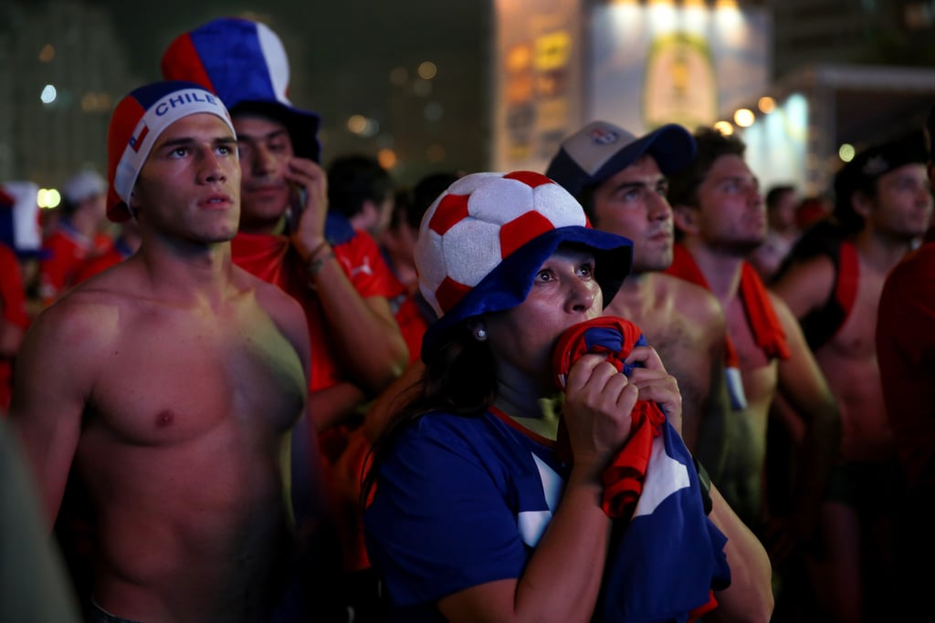 Chilean soccer fans watched their team play on a giant screen at Copacabana Beach in Brazil.