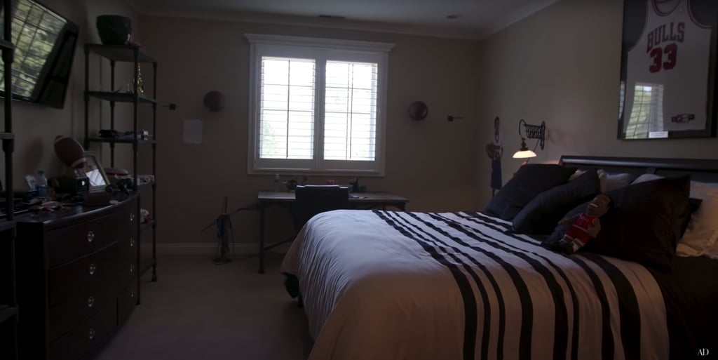 While showing us his son's bedroom, Pippen couldn't help but point out that his son is a Derrick Rose fan (peep the Derrick Rose figure on the bed). Don't worry, though — his son has his dad's jersey framed above his bed!