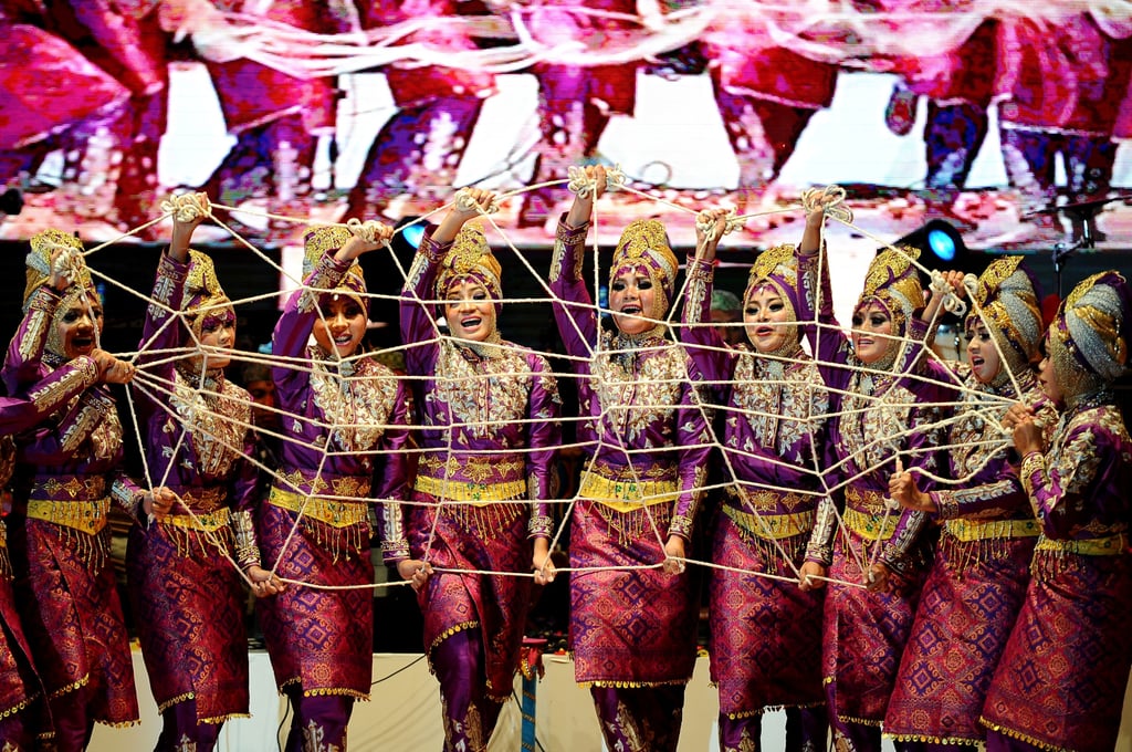 Dancers performed a traditional routine during a cultural festival in Indonesia.