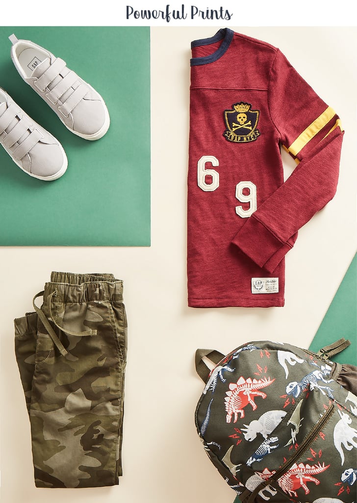Boys in patterns project a knowing style. The stripes on the logo slub varsity tee ($29.95) with the green camo joggers ($29.95) say that this kid feels good in his own skin. The just-plain-awesome reflective trainers ($49.95) and dinosaur fossils junior backpack ($44.95) add to his fearless style.
Confidence-boosting tip: Offer specific praise instead of general encouragement. “Good job with the violin!” is less meaningful to a kid than “You worked so hard on that piece of music and you learned it!”