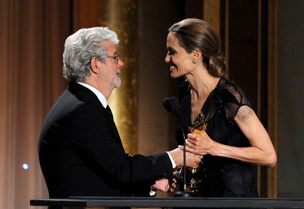 In November 2013, Angelina became the youngest person ever to receive the Jean Hersholt Humanitarian Award for her achievements in activism, including her work for the United Nations and her film projects related to humanitarian issues. She thanked Brad Pitt and her children in her moving speech, also adding, "I will do as my mother asked and I will do the best I can with this life to be of use."