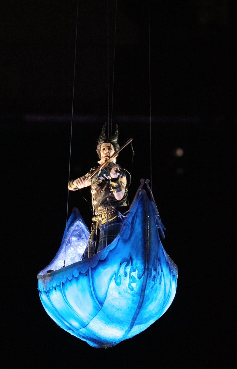 Performers played instruments in floating boats.