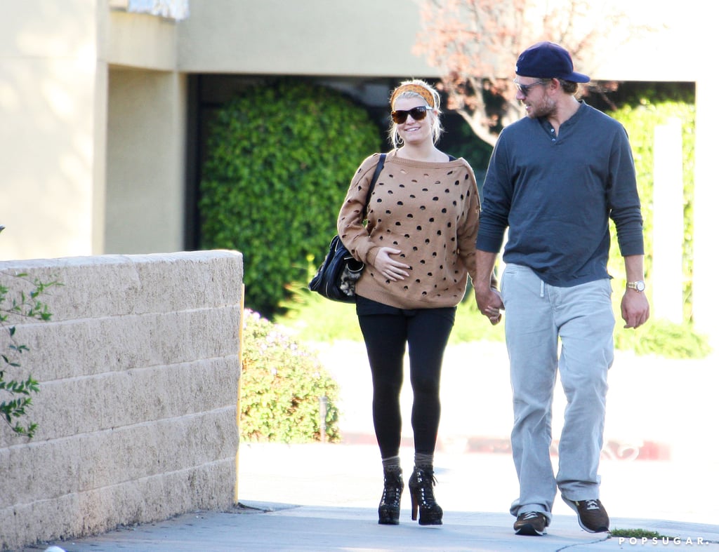 Jessica Simpson and Eric Johnson walked side by side to their car in LA in October 2011.