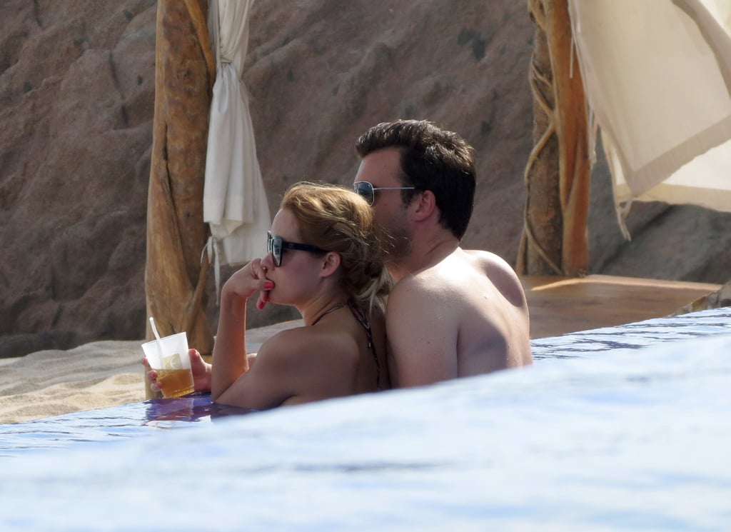 Lauren Conrad showed PDA poolside with William Tell while on a Cabo getaway in July 2012.