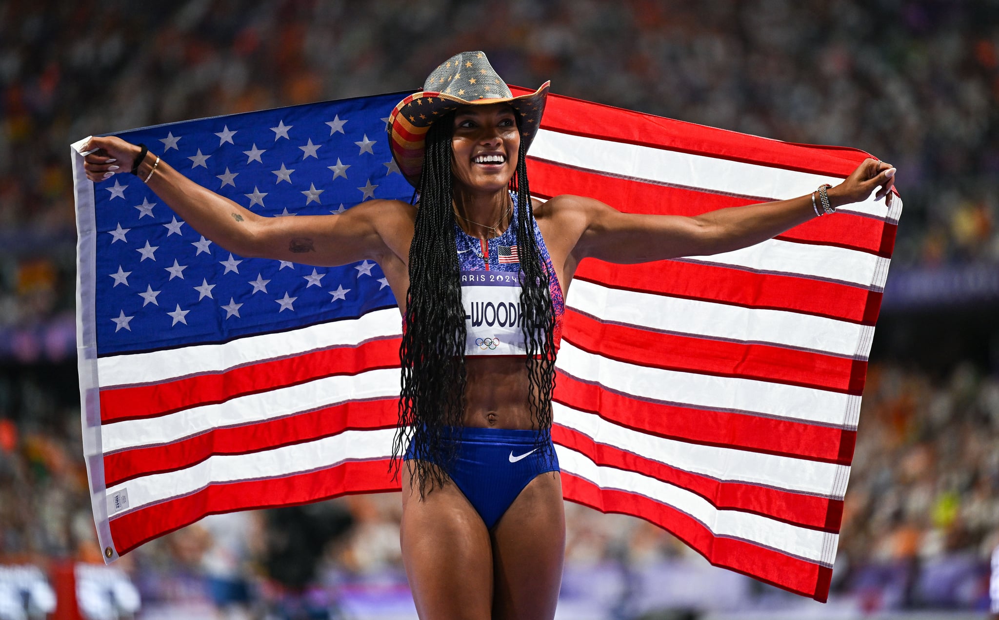 Paris , France - 8 August 2024; Tara Davis-Woodhall of Team United States celebrates after winning gold in the women's long jump final at the Stade de France during the 2024 Paris Summer Olympic Games in Paris, France. (Photo By Sam Barnes/Sportsfile via Getty Images)