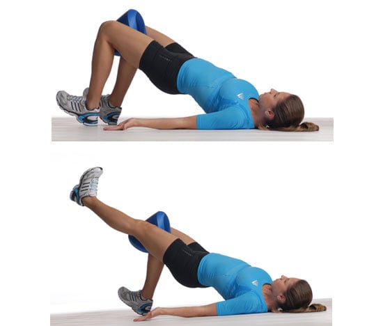 Glute bridge with deals medicine ball between knees