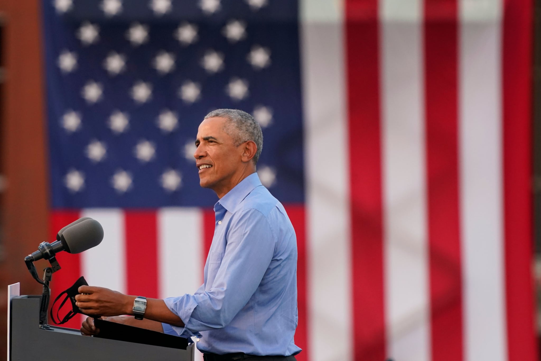 Former US President Barack Obama addresses Biden-Harris supporters during a drive-in rally in Philadelphia, Pennsylvania on October 21, 2020. - Former US president Barack Obama hit the campaign trail for Joe Biden today in a bid to drum up support for his former vice president among young Americans and Black voters in the final stretch of the White House race. (Photo by Alex Edelman / AFP) (Photo by ALEX EDELMAN/AFP via Getty Images)