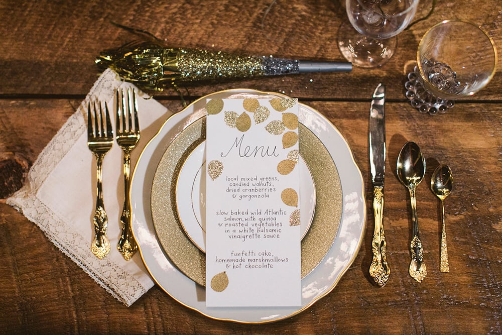 Silver and gold table settings add excitement to the meal.