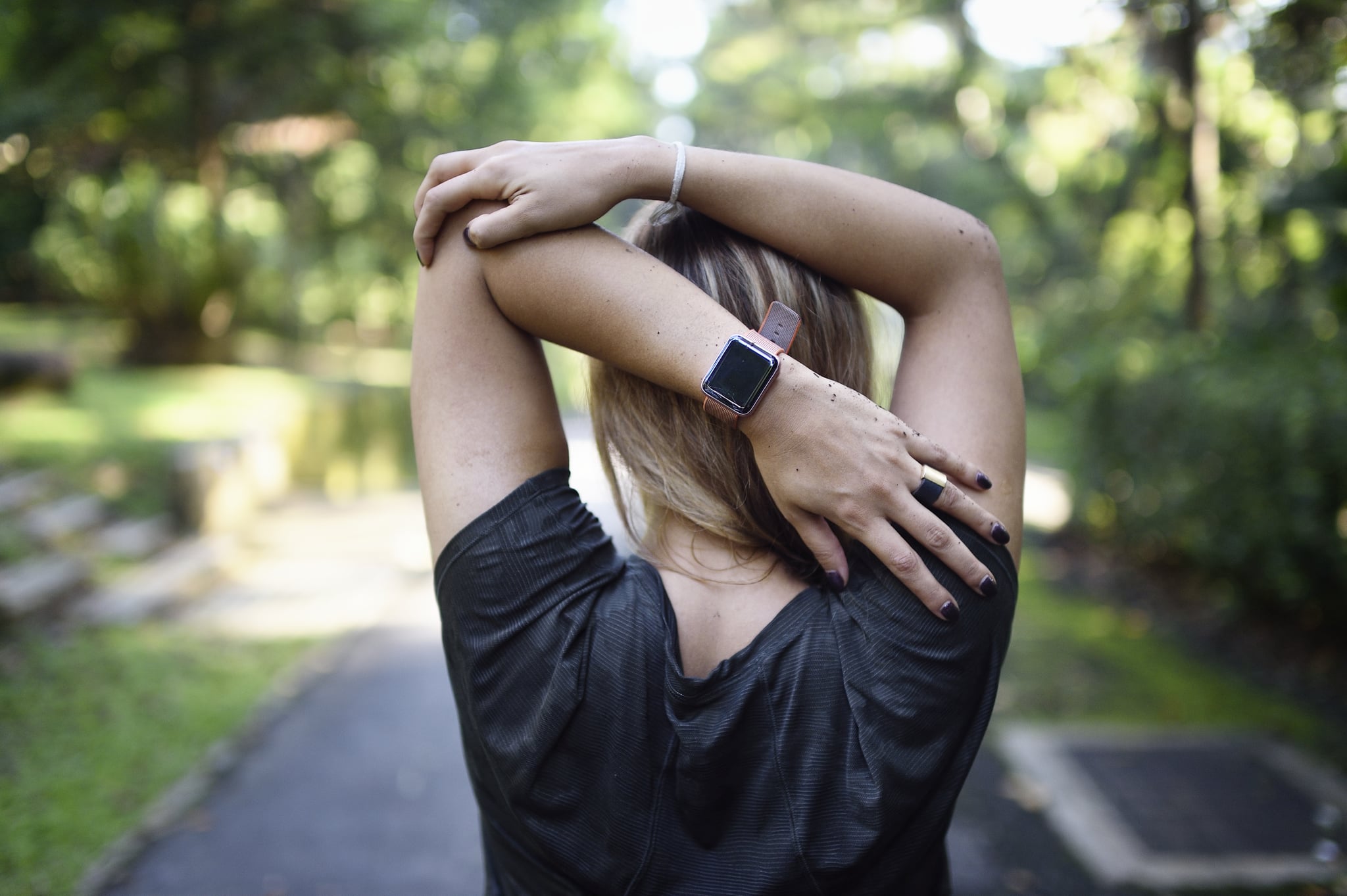 wearing a fitness tracker and a watch