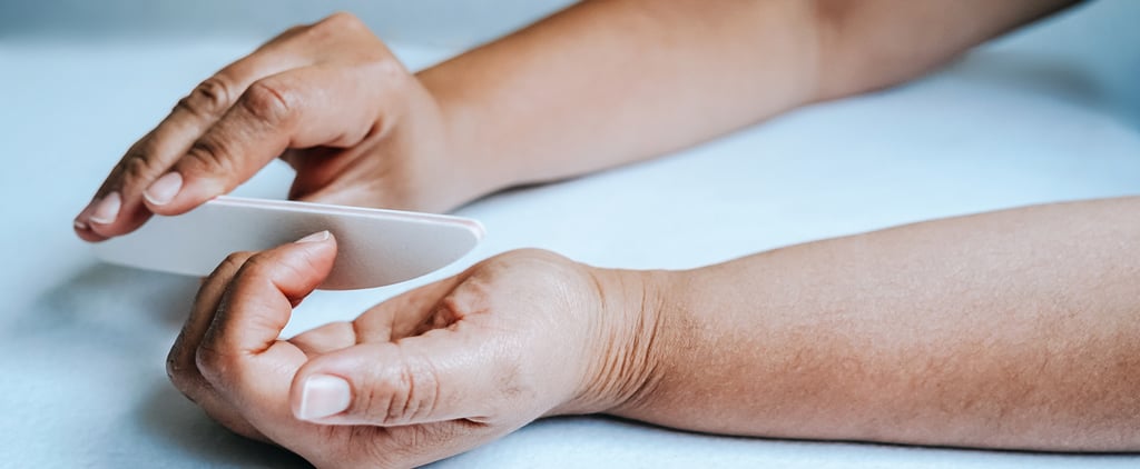 What Causes Those Vertical Black Lines on Nails? We Asked a Pro