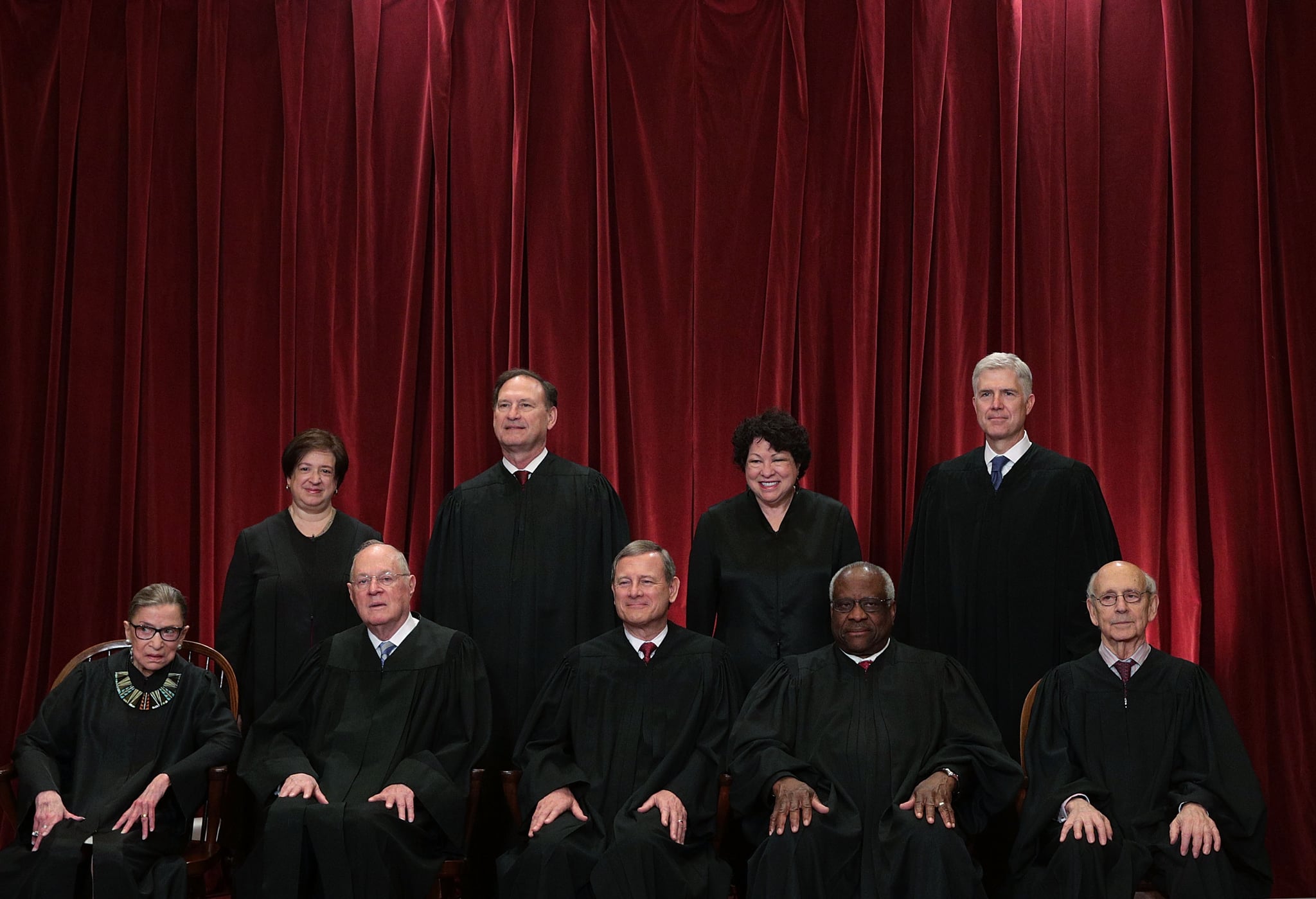 WASHINGTON, DC - JUNE 01:  Front row from left, U.S. Supreme Court Associate Justice Ruth Bader Ginsburg, Associate Justice Anthony M. Kennedy, Chief Justice John G. Roberts, Associate Justice Clarence Thomas, and Associate Justice Stephen Breyer, back row from left, Associate Justice Elena Kagan, Associate Justice Samuel Alito Jr., Associate Justice Sonia Sotomayor, and Associate Justice Neil Gorsuch pose for a group portrait in the East Conference Room of the Supreme Court June 1, 2017 in Washington, DC. The U.S. Supreme Court held a photo opportunity for photographers after Justice Gorsuch joined as the newest member.  (Photo by Alex Wong/Getty Images)