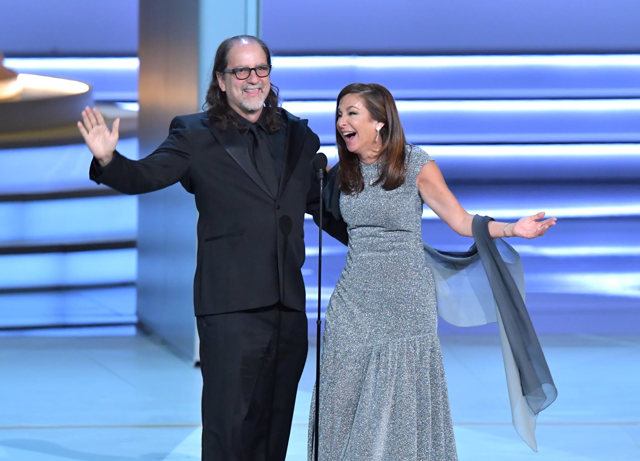 LOS ANGELES, CA - SEPTEMBER 17:  Glenn Weiss (L), winner of the Outstanding Directing for a Variety Special award for 'The Oscars,' and Jan Svendsen react after getting engaged onstage during the 70th Emmy Awards at Microsoft Theatre on September 17, 2018 in Los Angeles, California.  (Photo by Lester Cohen/WireImage)